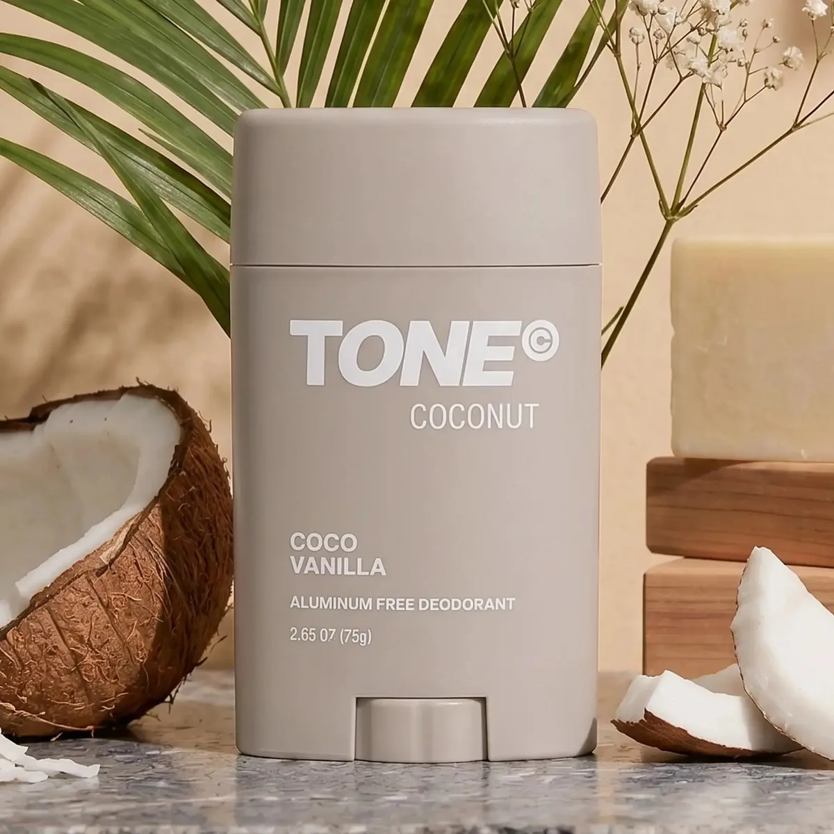 TONE Coconut Deodorant beside coconut