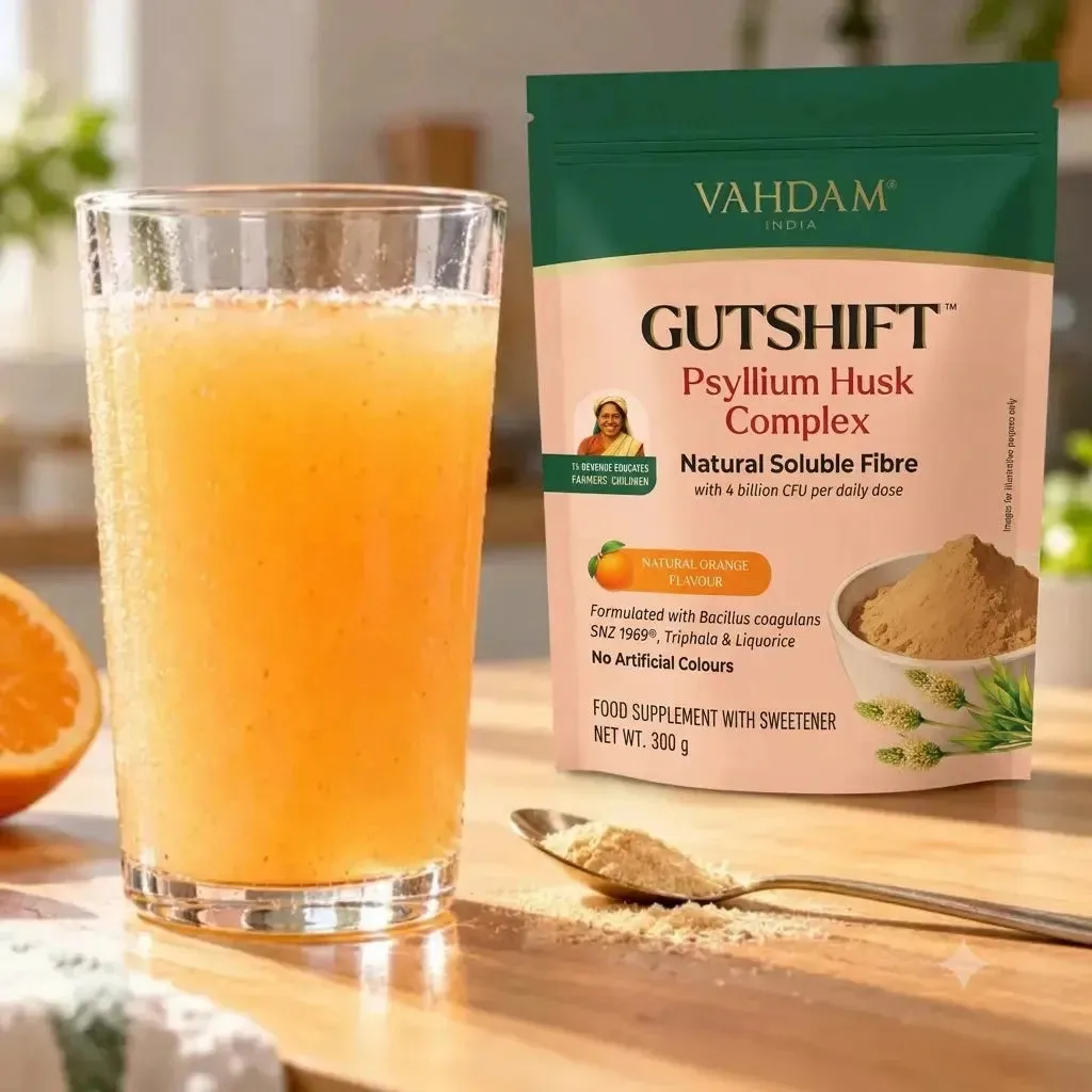 GutShift pouch beside an orange fibre drink