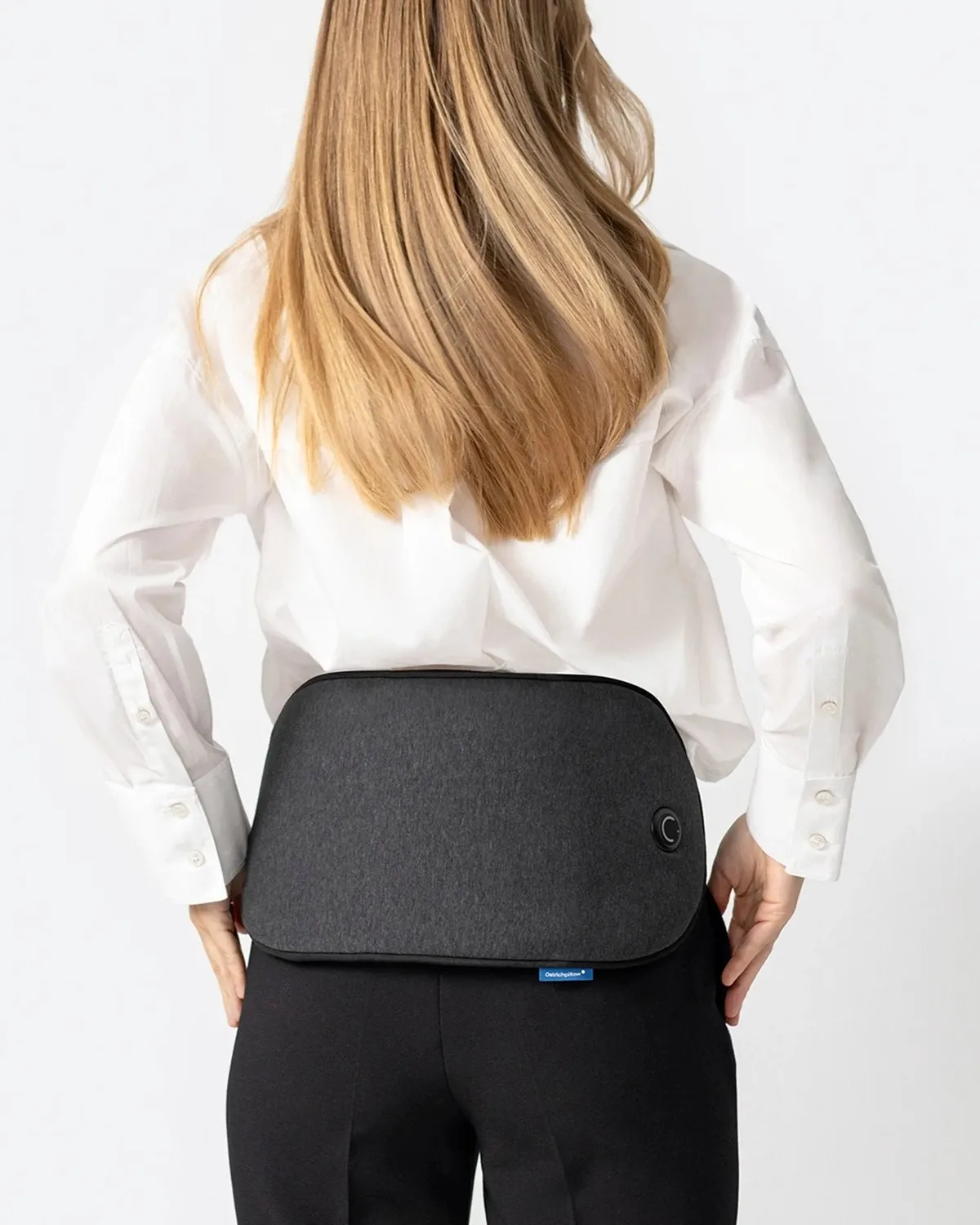 Embrace worn around the waist for cordless warmth