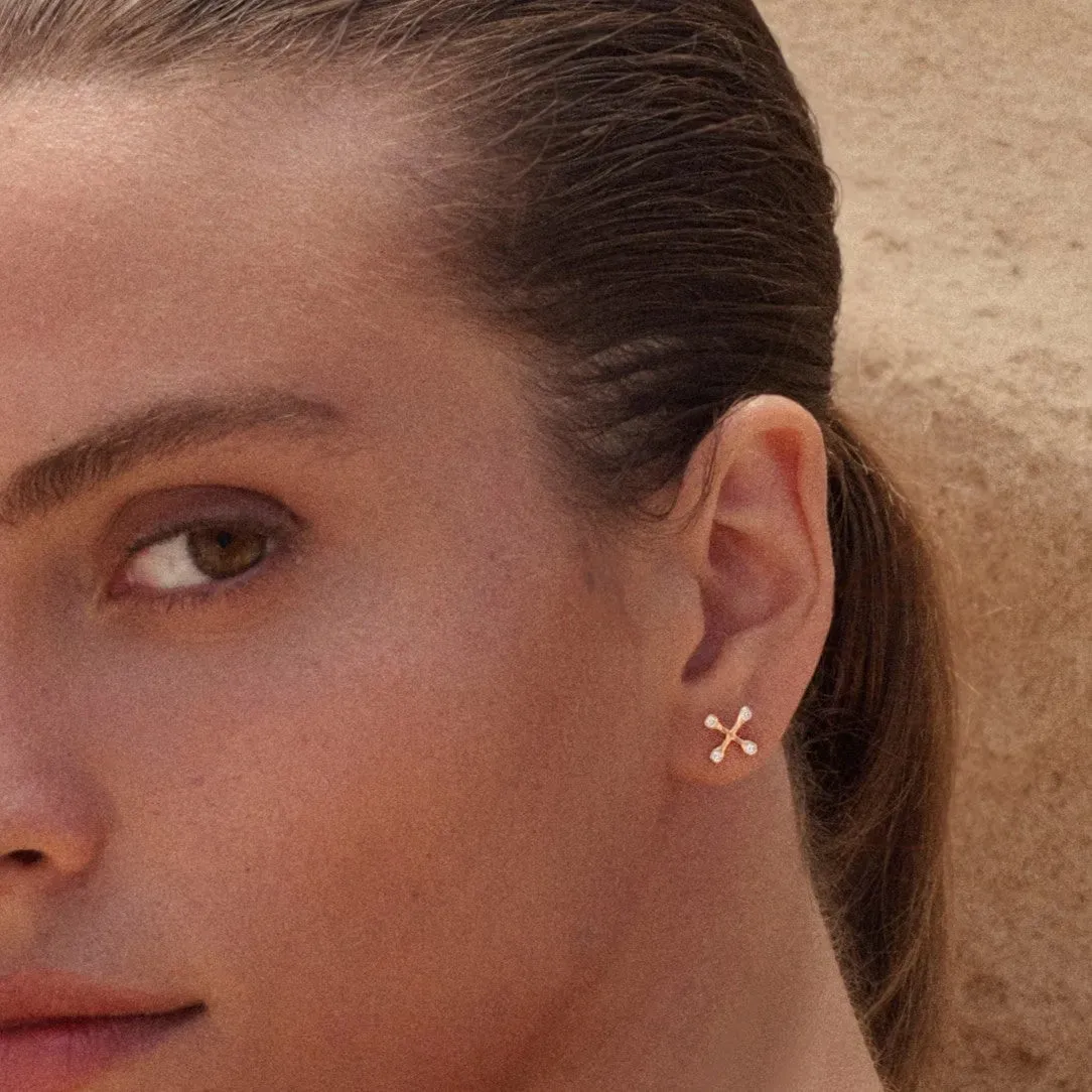Align Your Flow diamond earring worn on the ear