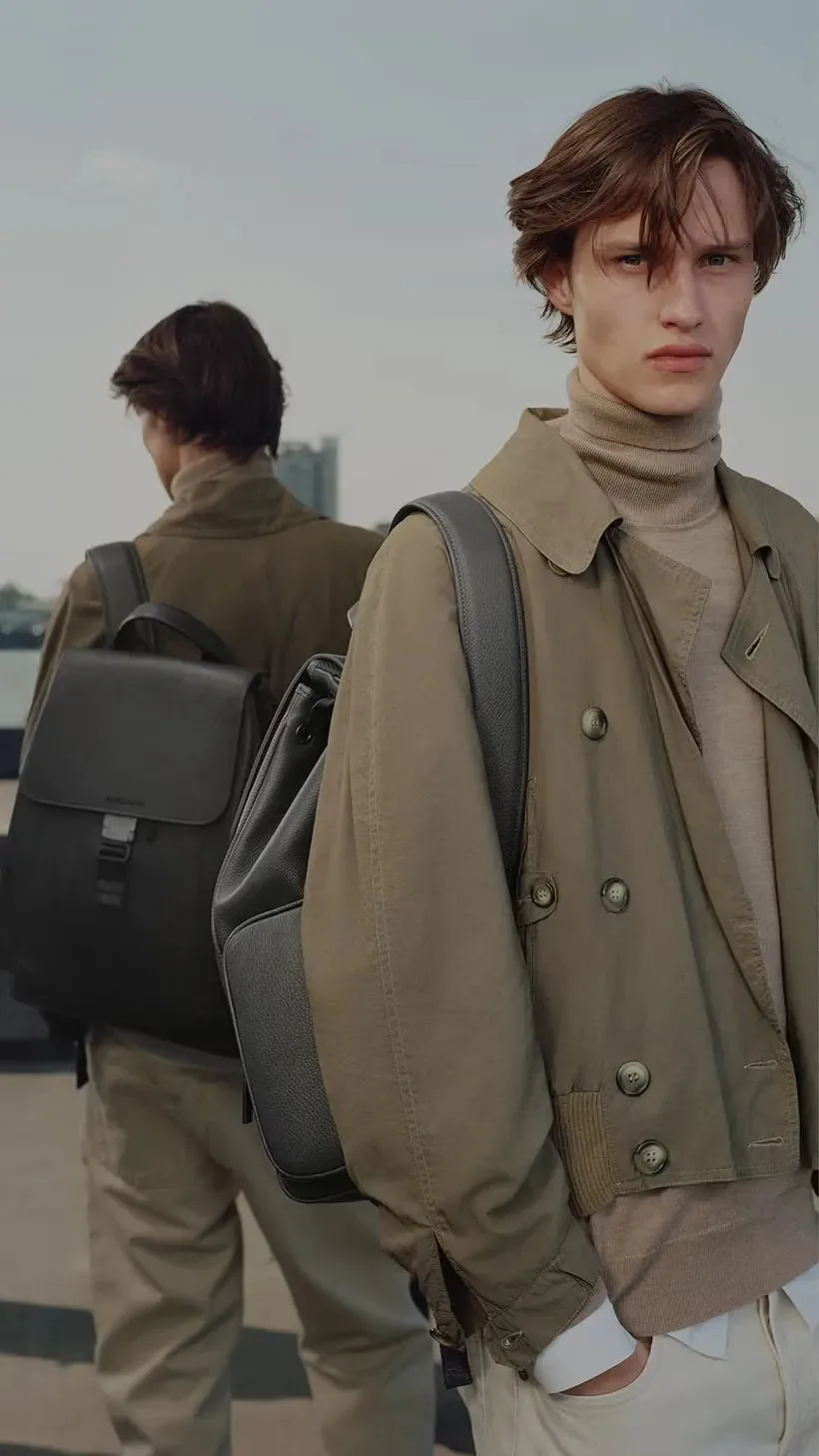 RIMOWA Never Still leather backpacks, carried through the city