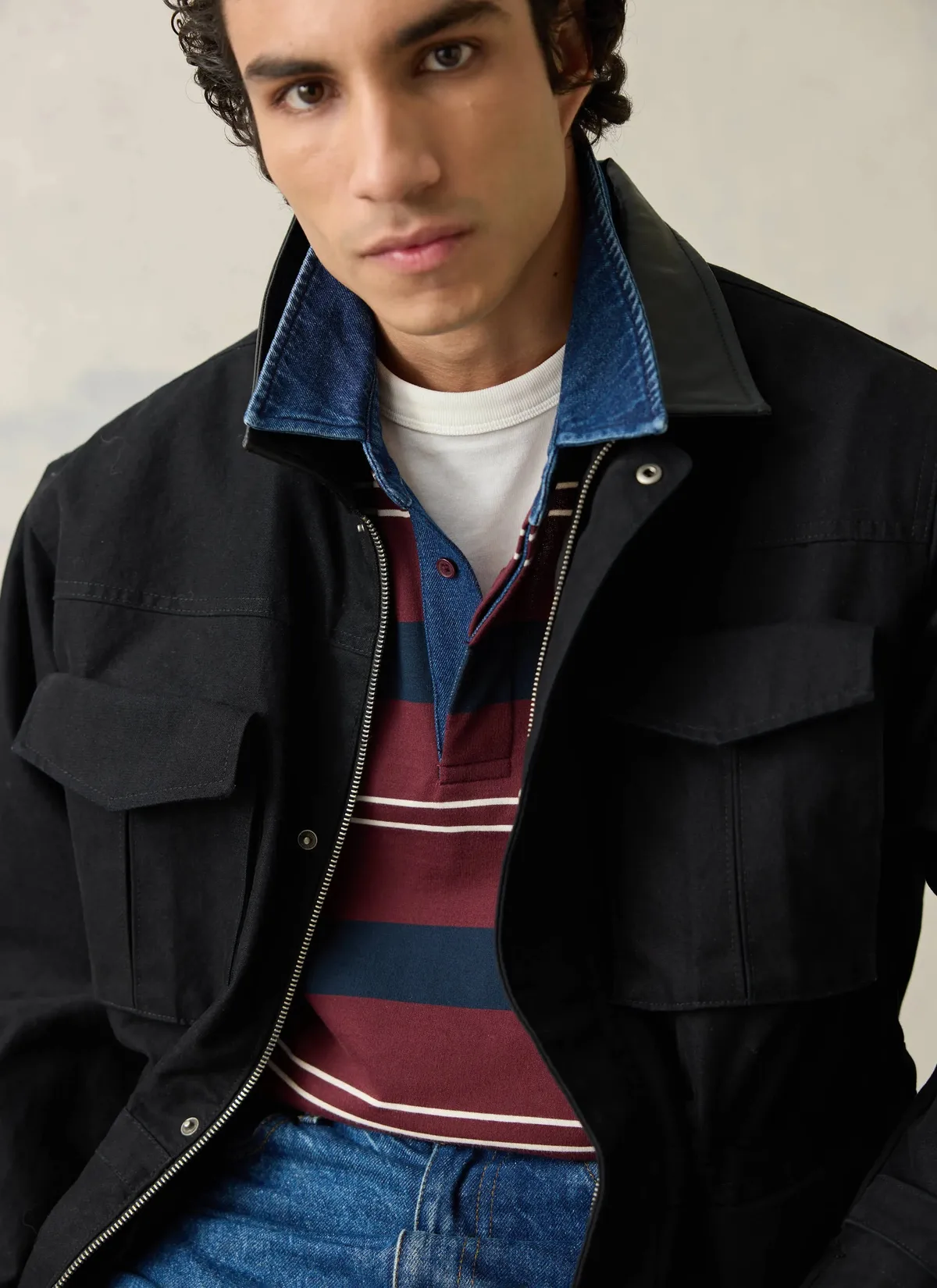 Editor Striped Rugby Polo layered beneath a jacket