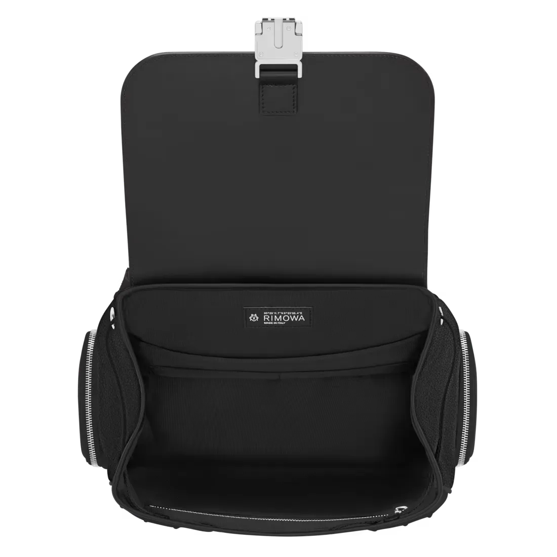 The open Flap Backpack, showing its textile interior and padded laptop pocket
